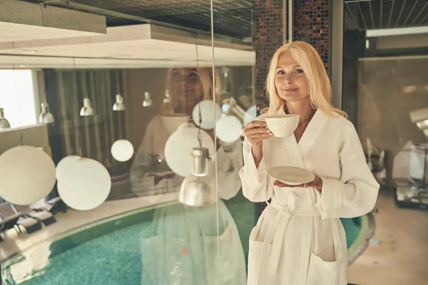 Hotel guest experiencing a boutique hotel pool and relax area